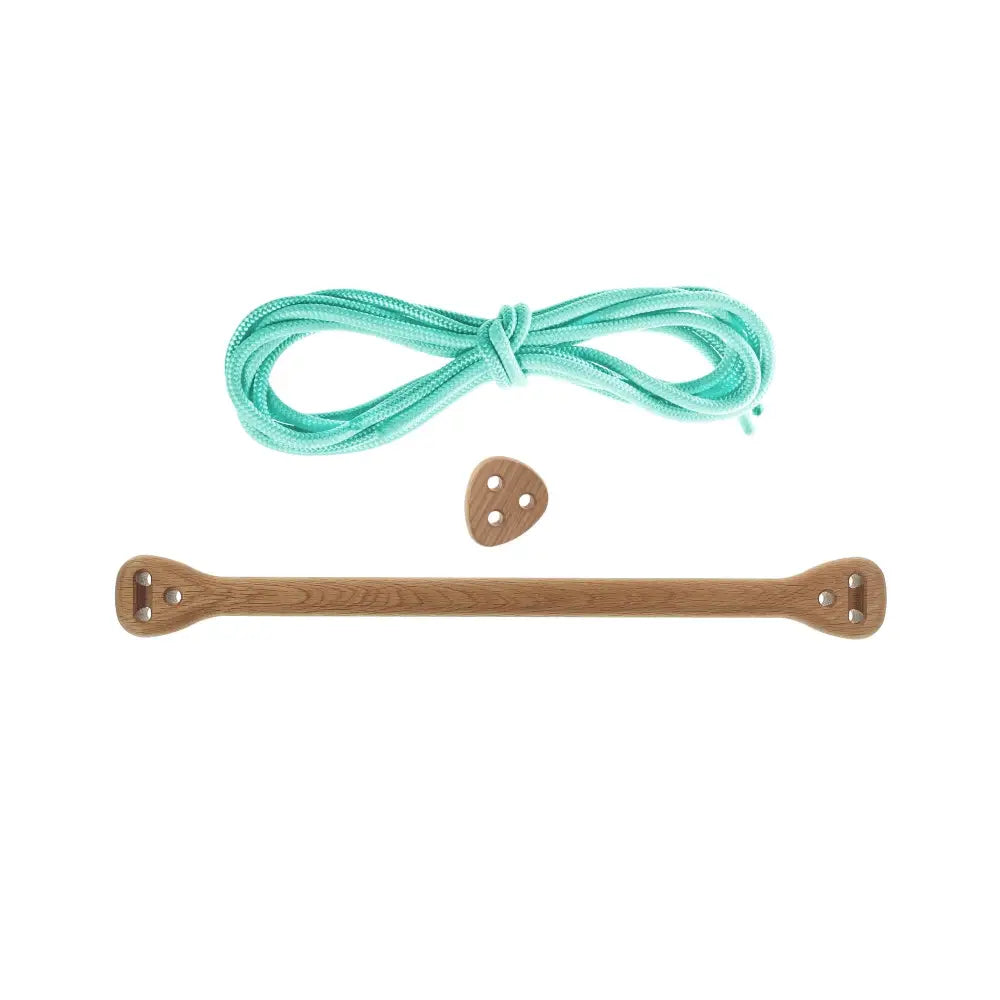 A wooden climbing grip bone oak with natural finish and mint green braided rope for climbing use