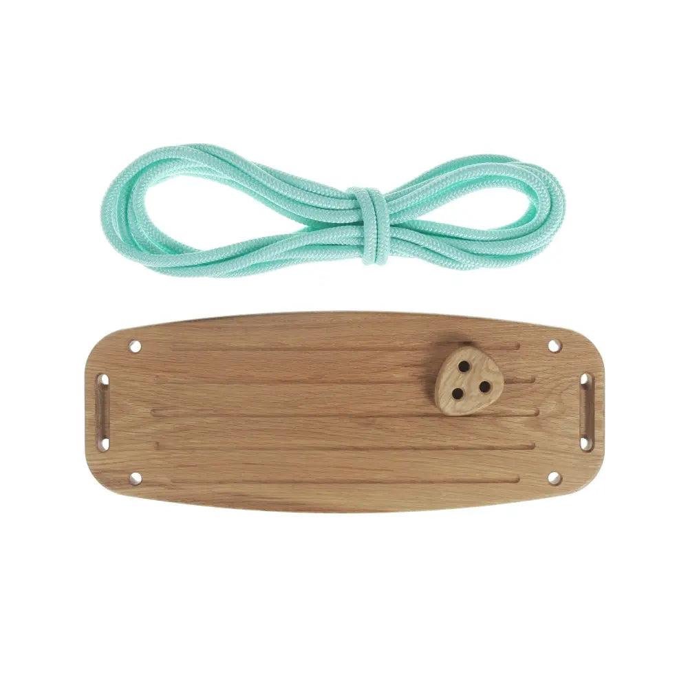 Light green braided rope attached to the back of a classic oak mint wooden board with three holes and two side slots