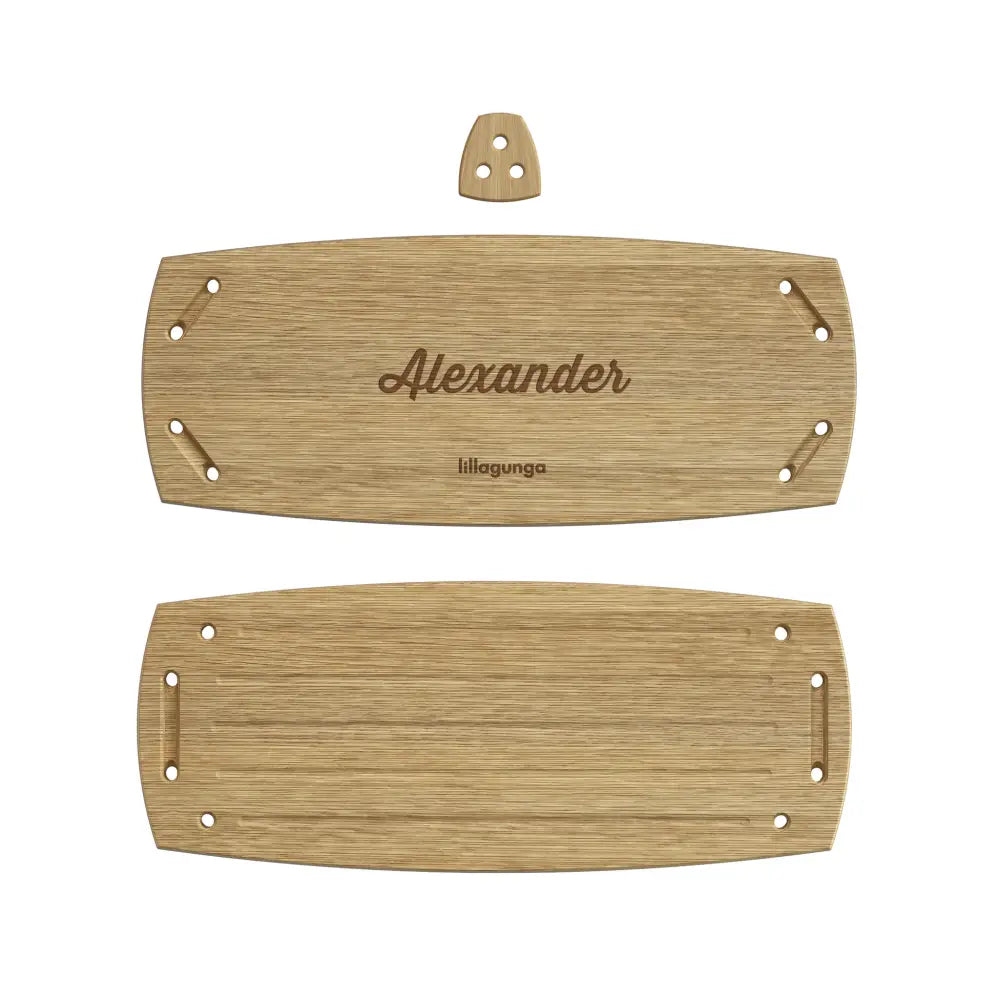 Light wood-grain grand personalised cutting board with engraved alexander and lilagunga text and corner holes for hanging