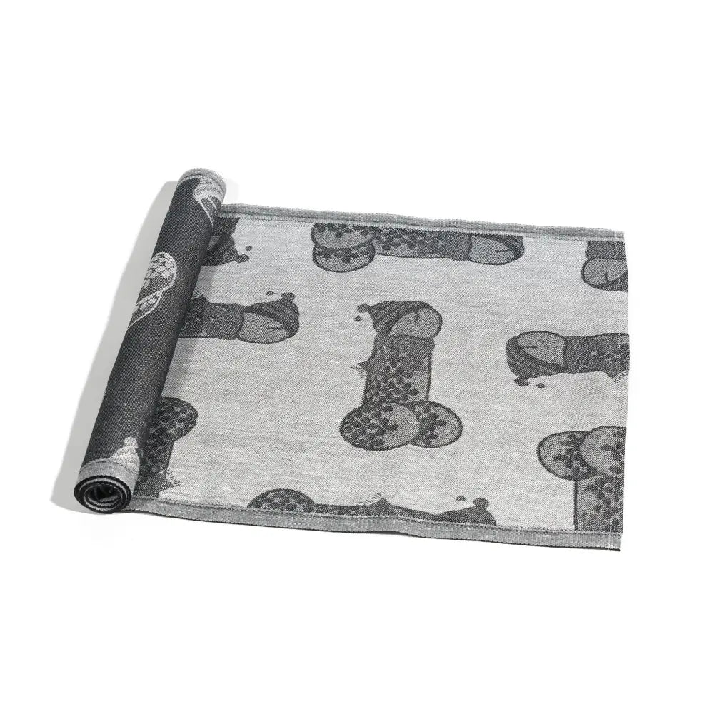 Gray woven kaitaliina rug with black and white cartoonish animal prints made from jokipiin pellava linen