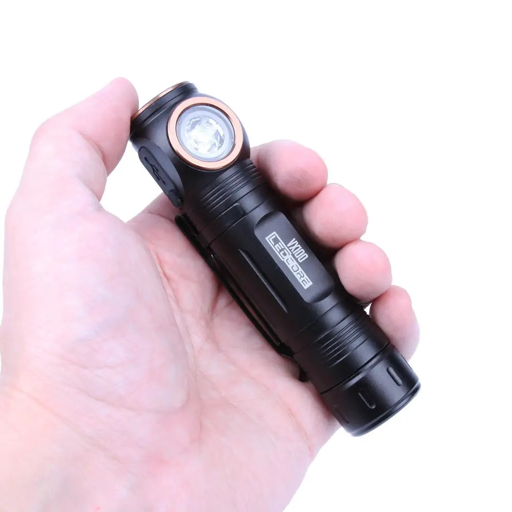 Ledcore vx100 ladattava otsavalo musta v1000 taktinen taskulamppu kuparinvärisellä kehyksellä ja teksturoidulla otteella