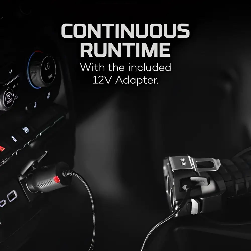 Black luxtreme sl 50 car charger with braided cable and red indicator light plugged into vehicle 12v socket