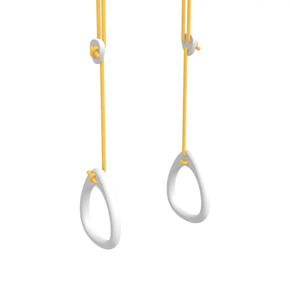 White plastic gymnastics rings with yellow suspension straps for fitness use from the birch yellow series