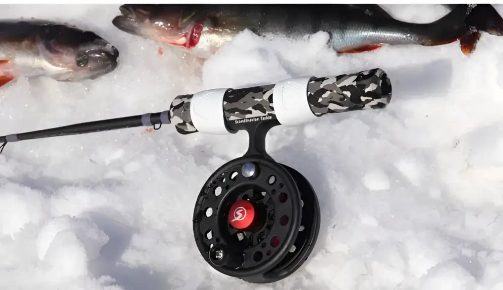 Black and white camouflage-patterned Scandinavian Tackle Quadstik 20 inch ice fishing rod with black reel and red handle accent