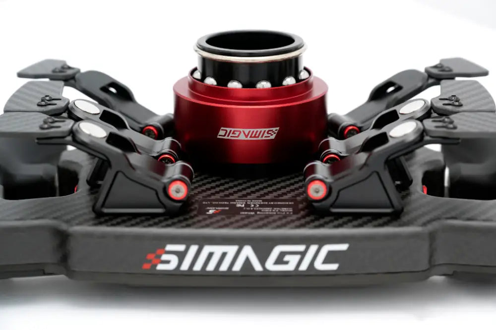 Red and black simmagic fx pro formula steering wheel drone landing gear with carbon fiber texture on the back side