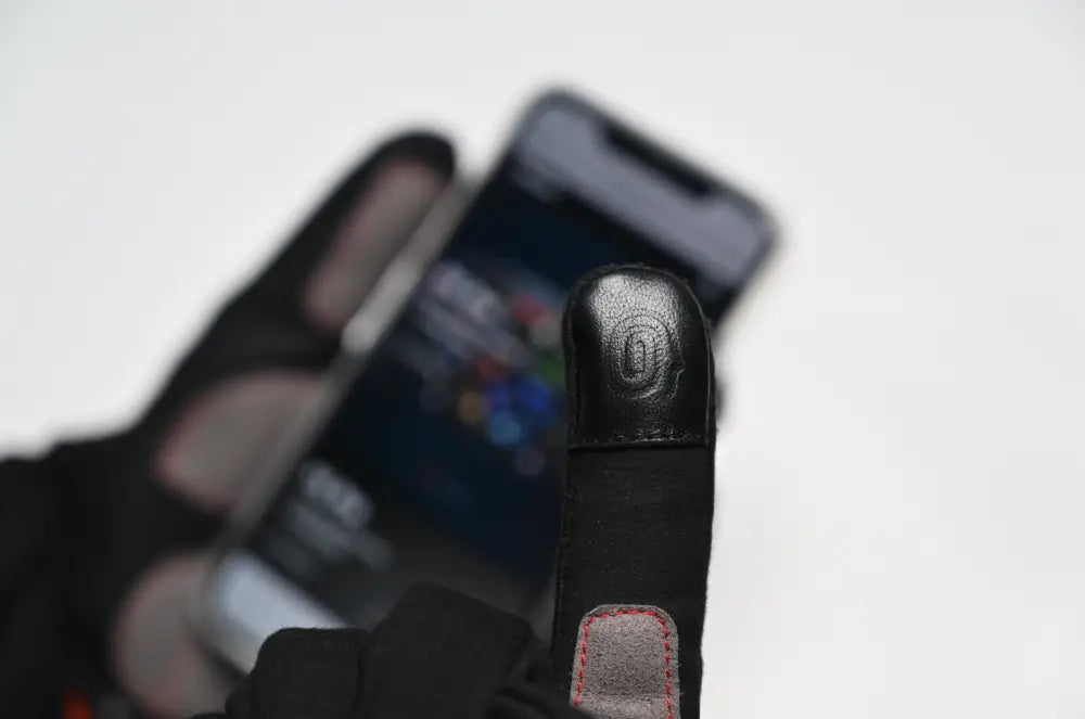Black touchscreen-compatible simagic interior seams gloves with textured leather fingertip and reinforced gray palm patch