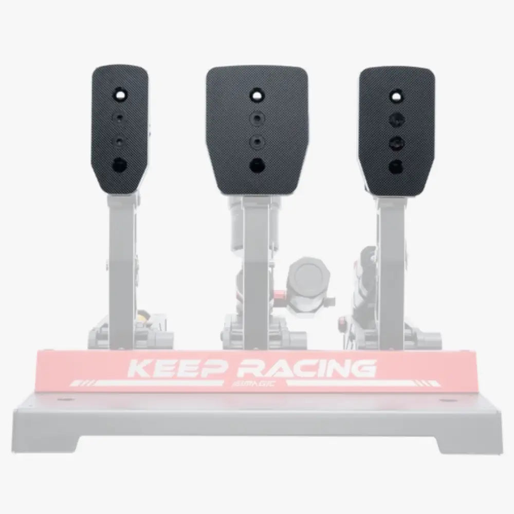 Simagic P1000 triple flat pedal plate set black carbon fiber textured racing pedals with silver stands on pink keep racing base