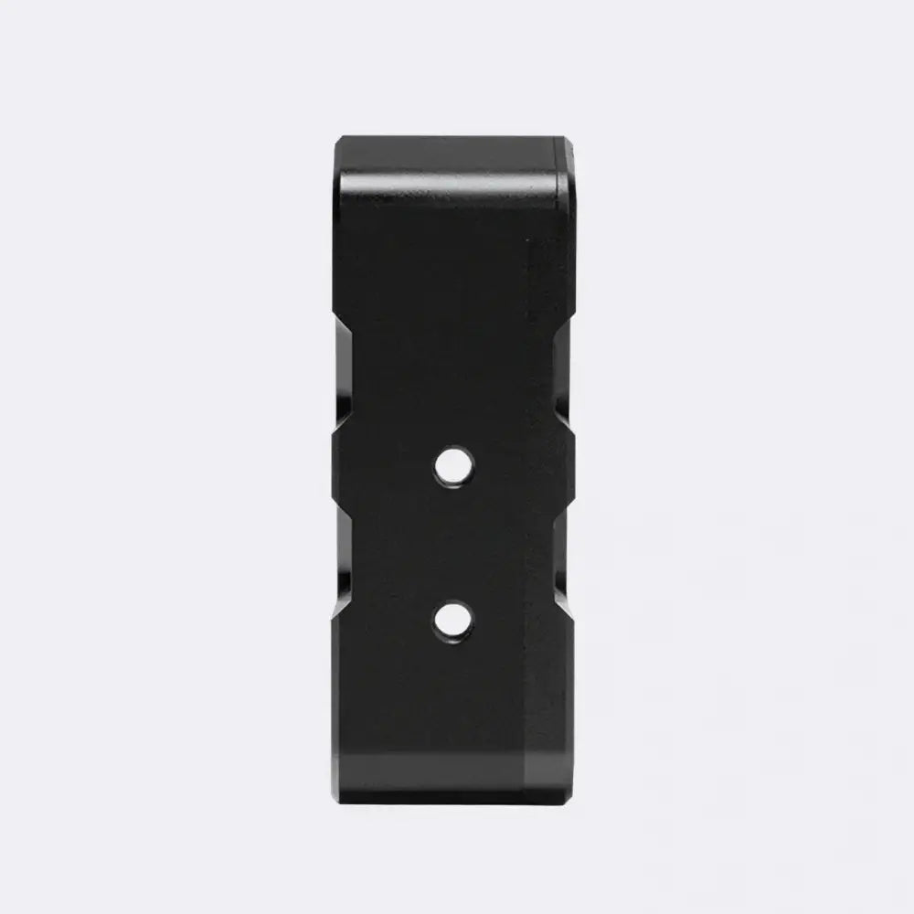 Black rectangular metal bracket with two circular holes for simagic p2000 haptic device mounting