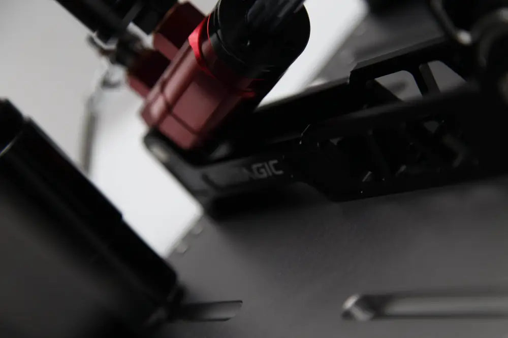 Black plastic simagic p2000 hydraulic 200kg 3-pedal set with red accent and engraved branding visible