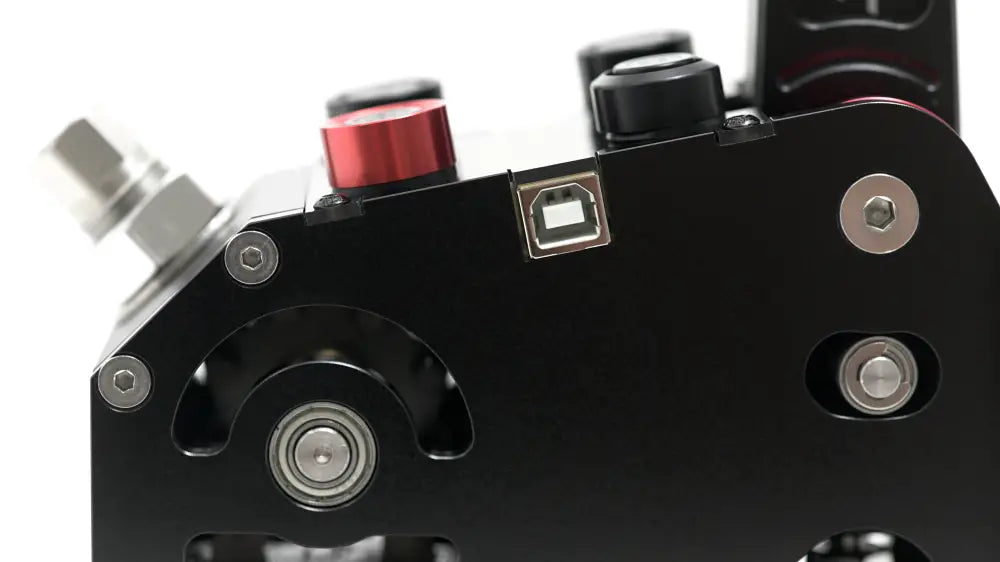 Black simagic q1 sequential shifter industrial-grade camera rig with red knob silver bolts and usb port visible