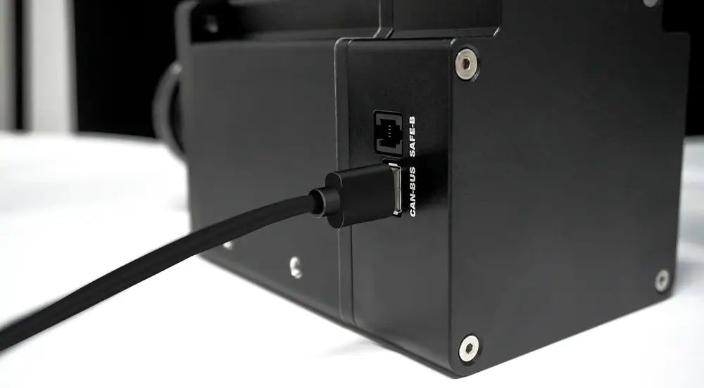 Black rectangular simagic usb extender p-e114 with usb-c and ethernet can-bus safe-e ports shown from back side