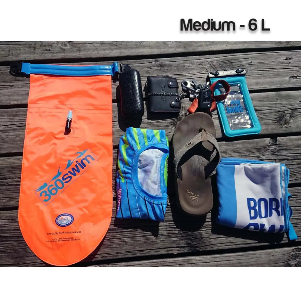 Ultra drybag buoy on kirkkaan oranssi 360swim ilmatäytteinen uimareppu sinisellä vetoketjulla ja logolla