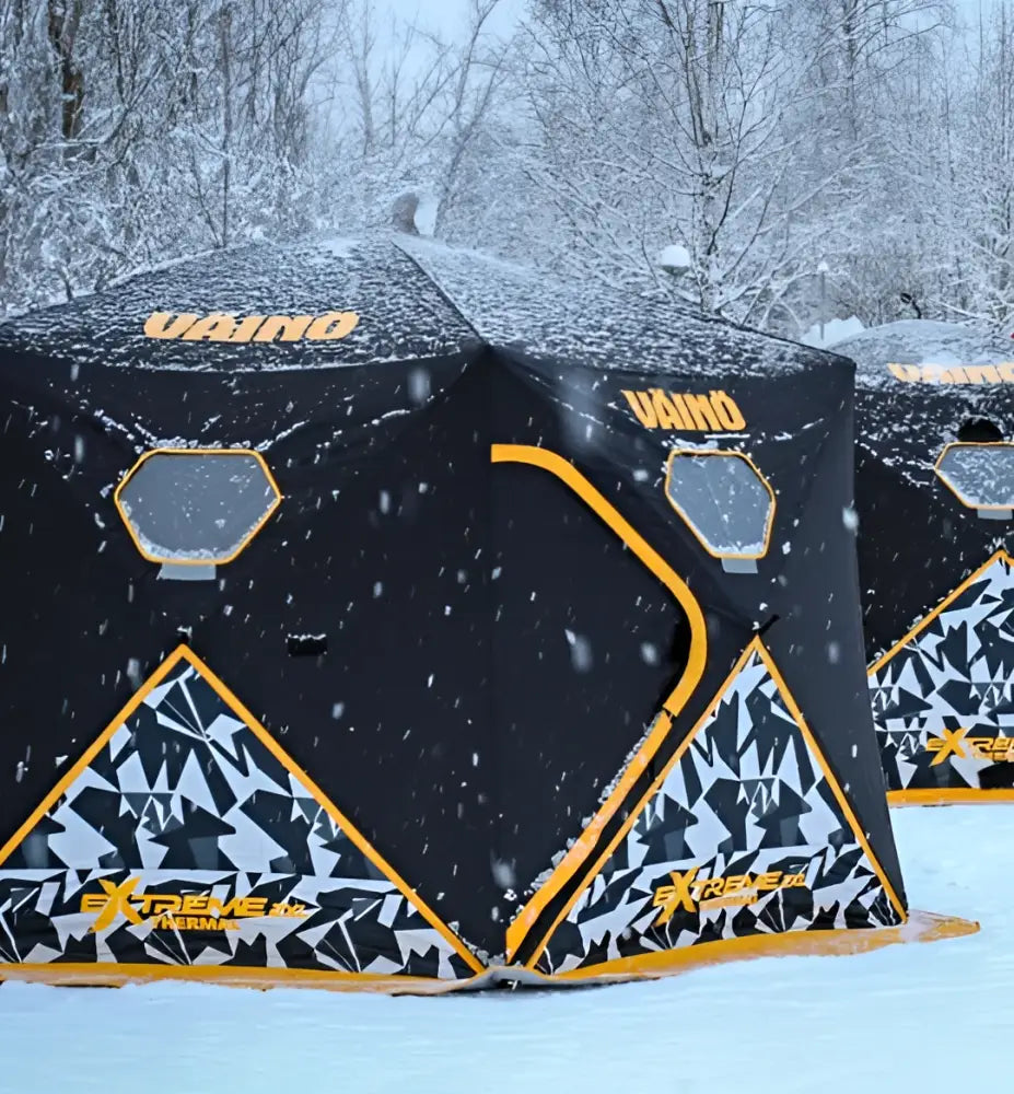 Mustan ja keltaisen vano extreme xl pilkkiteltta geometriakuvioiduilla paneeleilla väinö bunker thermal extreme xxl