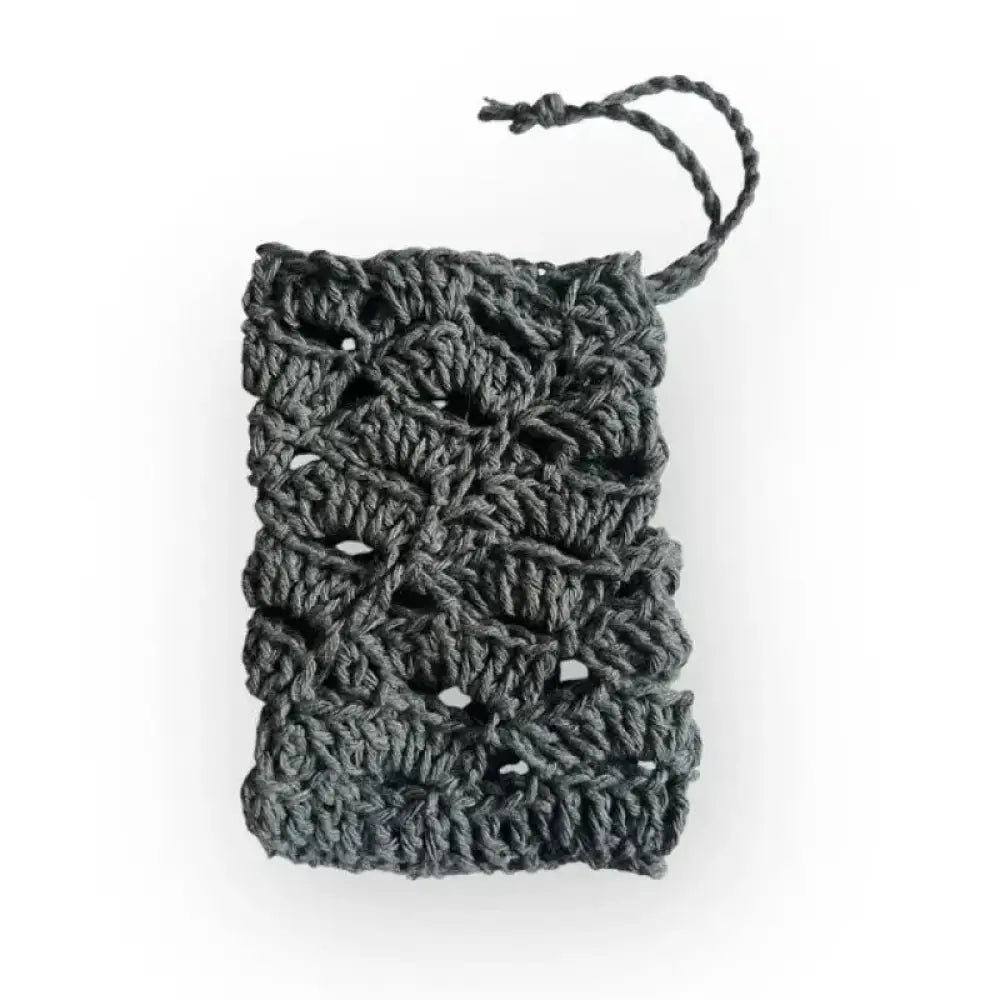Dark gray virkattu saippuapussi with drawstring closure made of crochet material for soap storage