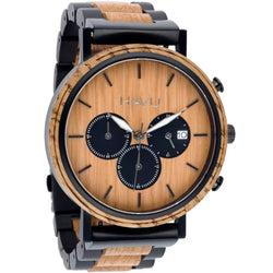 A sleek havu chronograph vuori 44mm watch with natural wood grain dial and alternating black and light brown wooden band links